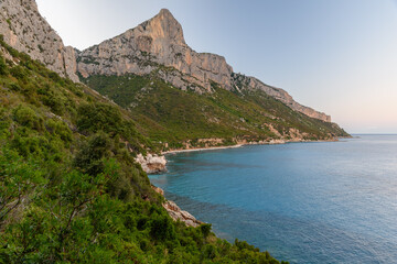 Fototapeta na wymiar Coastline near Santa Maria Navarrese with Punta Giradili in the background in east Sardinia