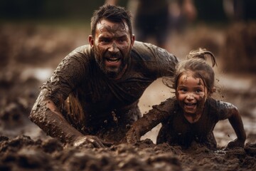 father and daughter covered in mud crawl determinedly during a mud run, faces alight with fierce joy and the thrill of the challenge, blurred background