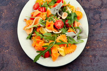 Vegetable salad with pasta.
