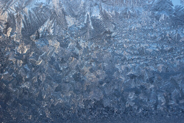 Winter frosty patterns on window glass
