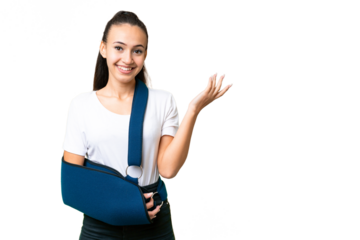 Young Arabian woman with broken arm and wearing a sling over isolated chroma key background extending hands to the side for inviting to come