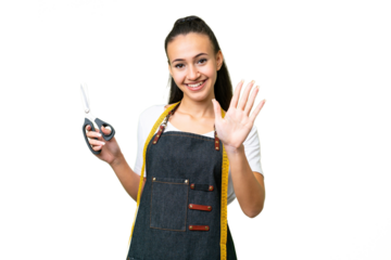 Young Seamstress woman over isolated chroma key background counting five with fingers