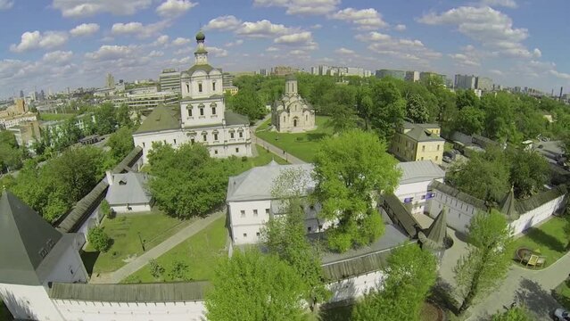 Spaso-Andronikov monastery with traffic on embankment