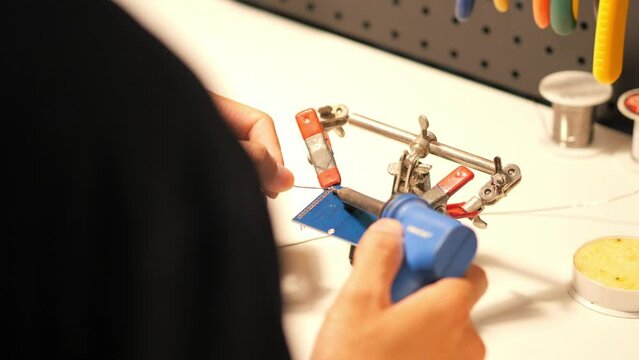 Top view soldering electronic circuit board