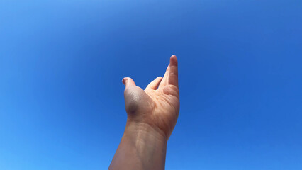 hands hand reaching in clear clean blue sky motion stretching arm symbol success, hope god love...
