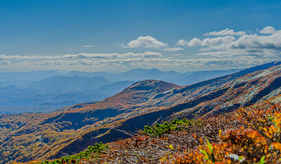 Fototapeta premium landscape of mountains and blue sky with clouds