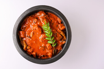 Kerala fish curry coconut milk gravy , cooking spicy Goan fish curry , Indian red fish curry Bengali fish curry in coconut milk Kolkata, India Sri Lanka. Lankan food.