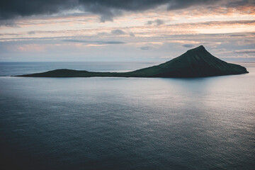 small island in atlantic ocean at dusk