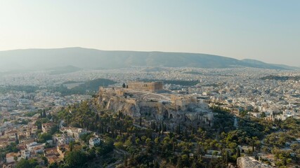Fototapeta na wymiar Athens, Greece. Acropolis of Athens in the light of the morning sun. Summer, Aerial View