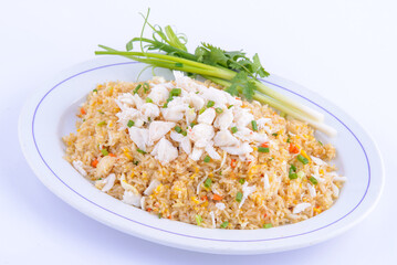 The best thai food dishes you must eat. Crab fried rice on the white dish.