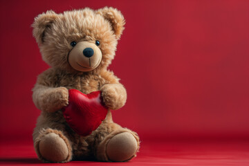 A cute teddy bear holding a red love heart, studio shot against a red background. Generative ai