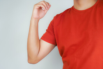 Health concept, person with elbow pain, man holding hand on elbow with pain, bone arthritis