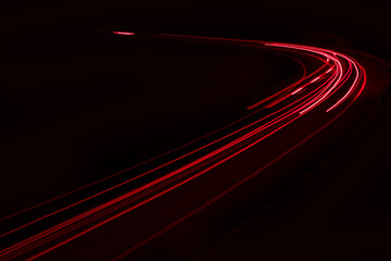 lights of cars driving at night. long exposure