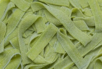 Close up of green apple flavored sugar coated candy strips