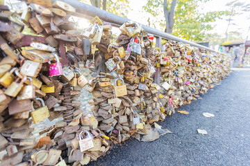 Multitude of padlocks attached to bridge, representing love and togetherness. Bridge of Love,...