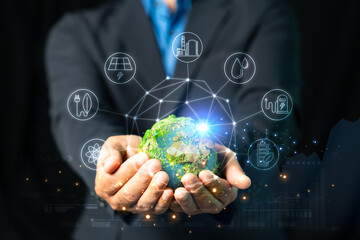 Hand holding global with icon sustainable. Business, natural green bokeh background,technology concept,alternative energy,conservative clean energy,ESG concept,Carbon credit,Carbon neutral.