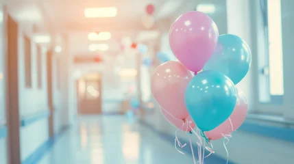 Schilderijen op glas Bunch of pastel color balloons floating in a bright hospital corridor with a soft, defocused background, suggesting a celebratory event like a patient discharge © EVGENIA
