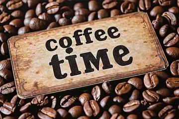 Foto op Canvas Vintage coffee time text. Dark brown background with cup of espresso creating cozy atmosphere for retro cafe concept with roasted beans and aromantic elements © Bussakon