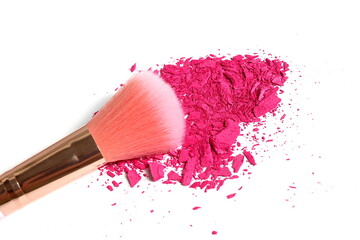 On a white background there is a brush for applying makeup with pink shadows.