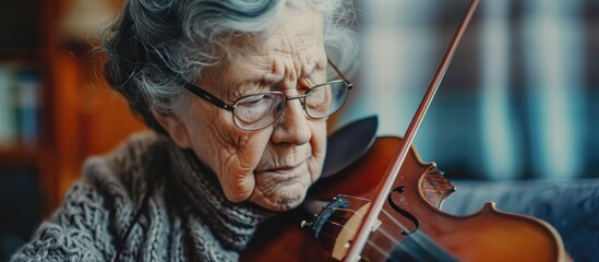 Using music therapy to treat dementia in an elderly woman. - obrazy, fototapety, plakaty