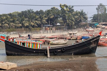 Fototapeta na wymiar Traditional wooden boats in Cox's Bazar Ghat in Bangladesh