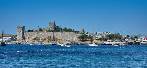 Bodrum, Turkey, Aegean Sea, view of a city, an embankment with restaurants and the old castle of St. Peter.