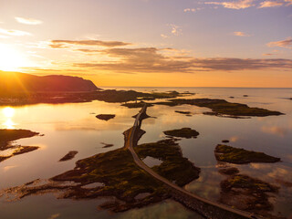 Summer sunset view of Lofoten, Norway scenery from above, with high mountains, fjord of Selfjord,...