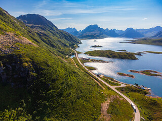norway, lofoten islands - aerial view of fjord and mountains, clear ský and warm colours. Road E10 towards Reine, near Ramberg
