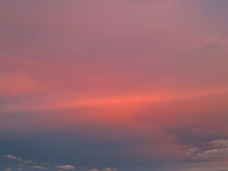 Pink clouds in the sunset sky