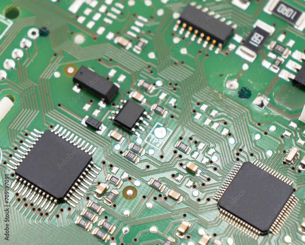 Poster circuit board with resistors microchips and electronic components background. computer hardware tech
