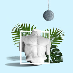 Body of statue with palm leaves on blue background. Minimal art