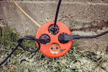 Extension cord, cable with three used sockets