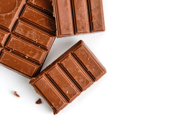 Bar of milk chocolate white background.