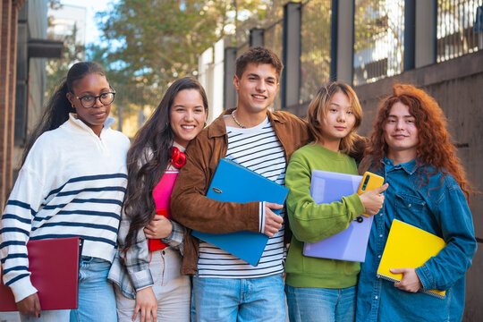 Portrait closeup multiracial group of students smiling looking at camera outdoor