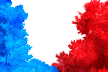 Macro photography blue and red salt crystal white background.