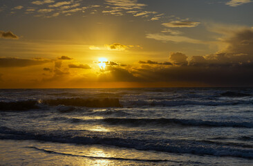 sea against sunset background