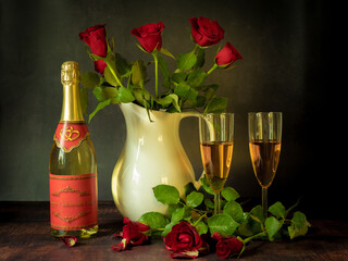 Antique-style still life with champagne and roses on the theme of Valentine's Day. - 709210602