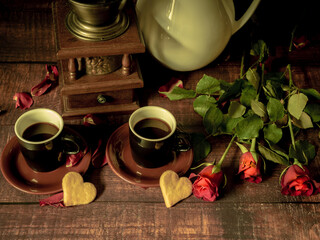 Antique-style still life with coffee and roses on the theme of Valentine's Day. - 709210671