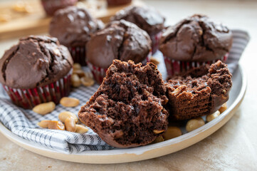 Chocolate muffins with peanuts