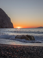 Sunset at the Black beach Perissa Santorini