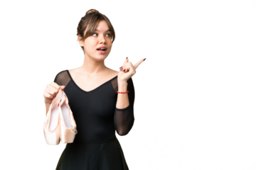 Young girl practicing ballet over isolated chroma key background intending to realizes the solution while lifting a finger up