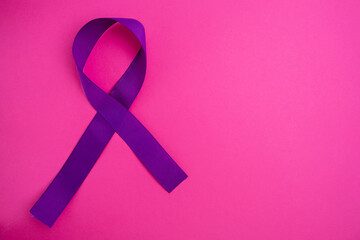 International Epilepsy Day. Purple ribbon on a color background. Alzheimer's disease, pancreatic...