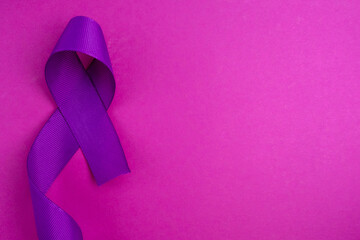 International Epilepsy Day. Purple ribbon on a color background. Alzheimer's disease, pancreatic...