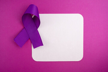 International Epilepsy Day. Purple ribbon on a color background. Alzheimer's disease, pancreatic cancer, Hodgkin's lymphoma awareness. copy space. September 21. World Lupus Day