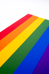 Rainbow flag on a light background. LGBT flag. LGBTQIA Pride Month in June. Lesbian-gay-bisexual-transgender. Gender equality. Human rights and tolerance. Rainbow flag