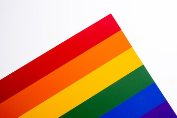 Rainbow flag on a light background. LGBT flag. LGBTQIA Pride Month in June. Lesbian-gay-bisexual-transgender. Gender equality. Human rights and tolerance. Rainbow flag