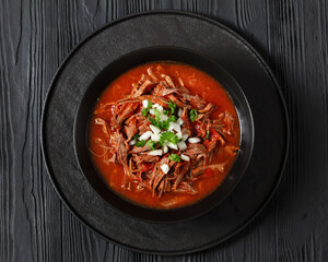 birria de res, mexican beef stew in pepper sauce