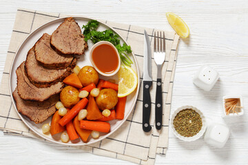 roast beef with dipping sauce and winter veggies