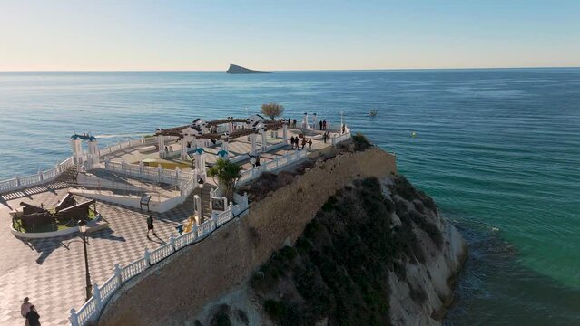 Benidorm Morning. Aerial Drone View of people walking on Plaza del Castell in Beautiful Light. Drone static 4k video