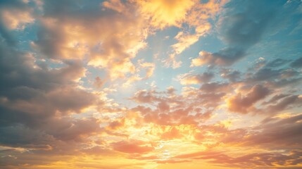 Obraz premium A serene sky adorned with subtle shades of gray, yellow, and orange, featuring soft clouds.